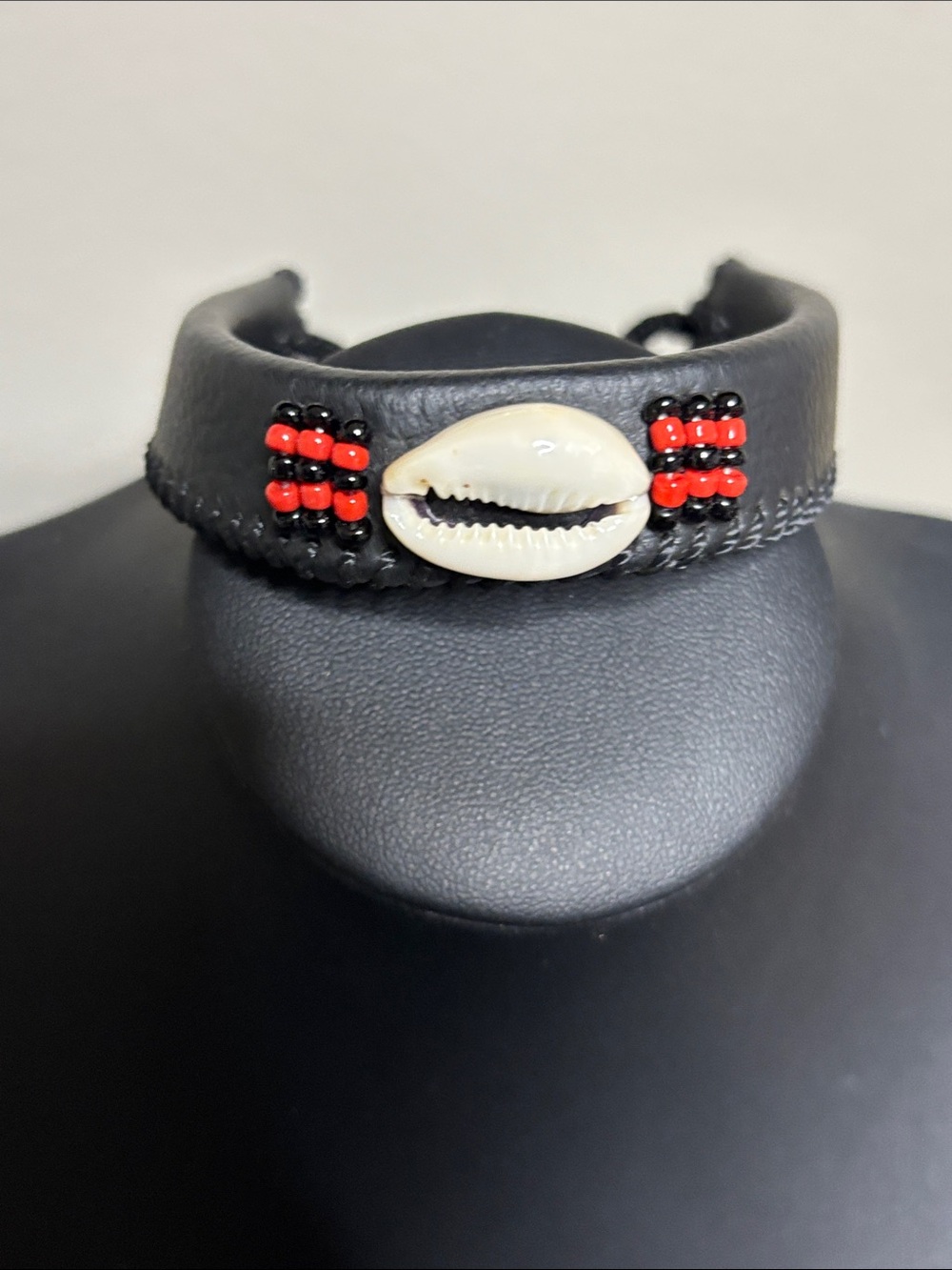 Handcrafted Black Leather Cowrie Shell Bracelet with Red & Black Beads